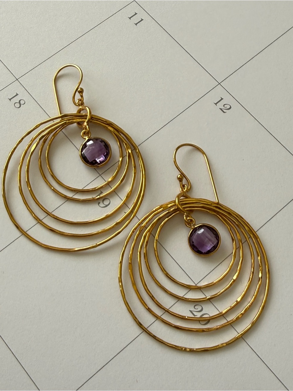 Gold-Tone Hoop Earrings with Purple Gem Dangle